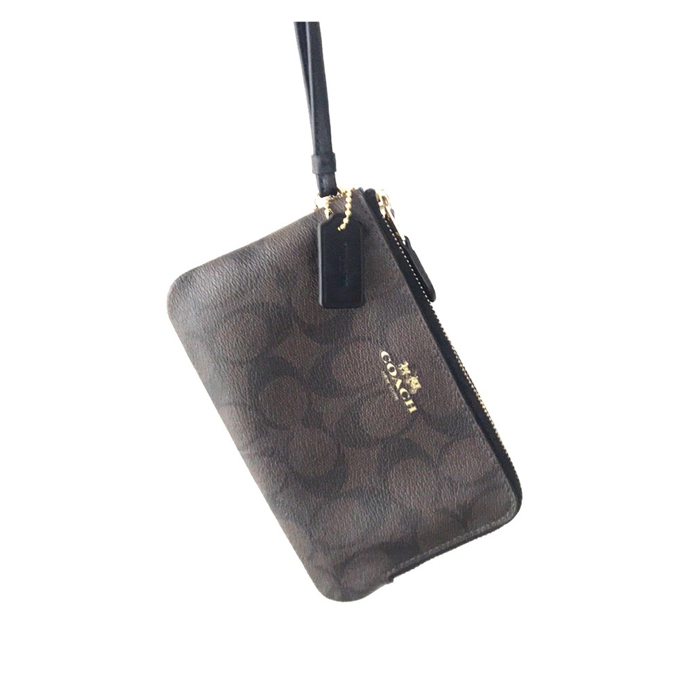 Small Coach double zip wristlet. Never used.